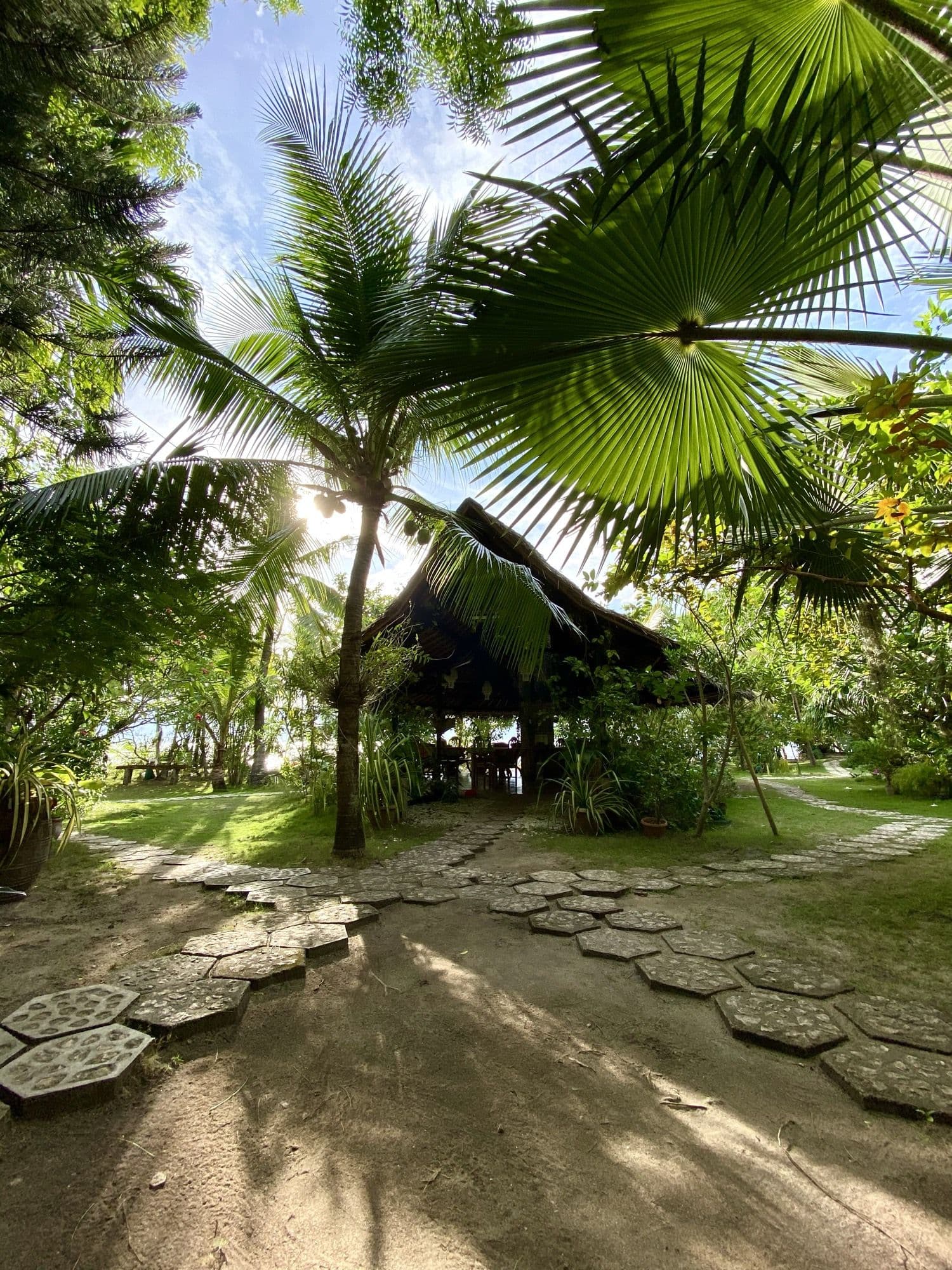 A bungalow nestled among the palms